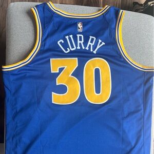 Unisex Nike Stephen Curry Royal Golden State Warriors 2022/23 Swingman Jersey